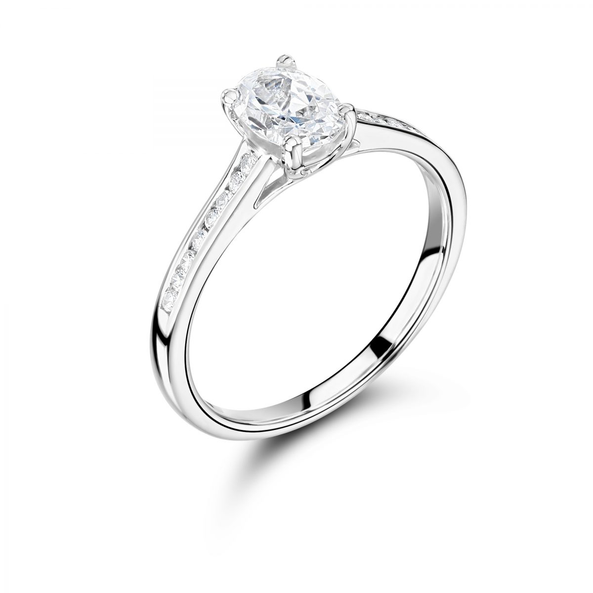 Oval Cut Diamond Ring With Channel Set Shoulders London Wedding Ring Company